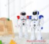 The radio-controlled EX9020 robot responds to hand movements, dances, walks, drives, speaks